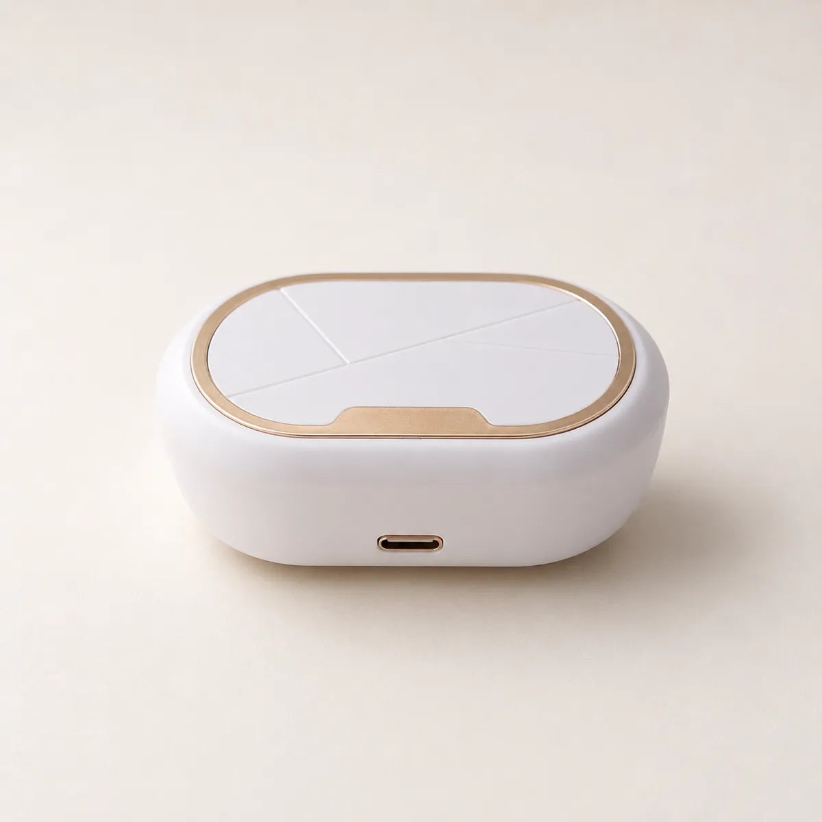 OptiClean closed &mdash; premium studio shot showing white pebble body and rose-gold rim